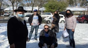 Chabad Volunteers Brave Treacherous Roads to Deliver Necessities During Winter Storm