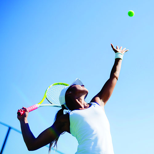 Tennis Woman Serve Ball