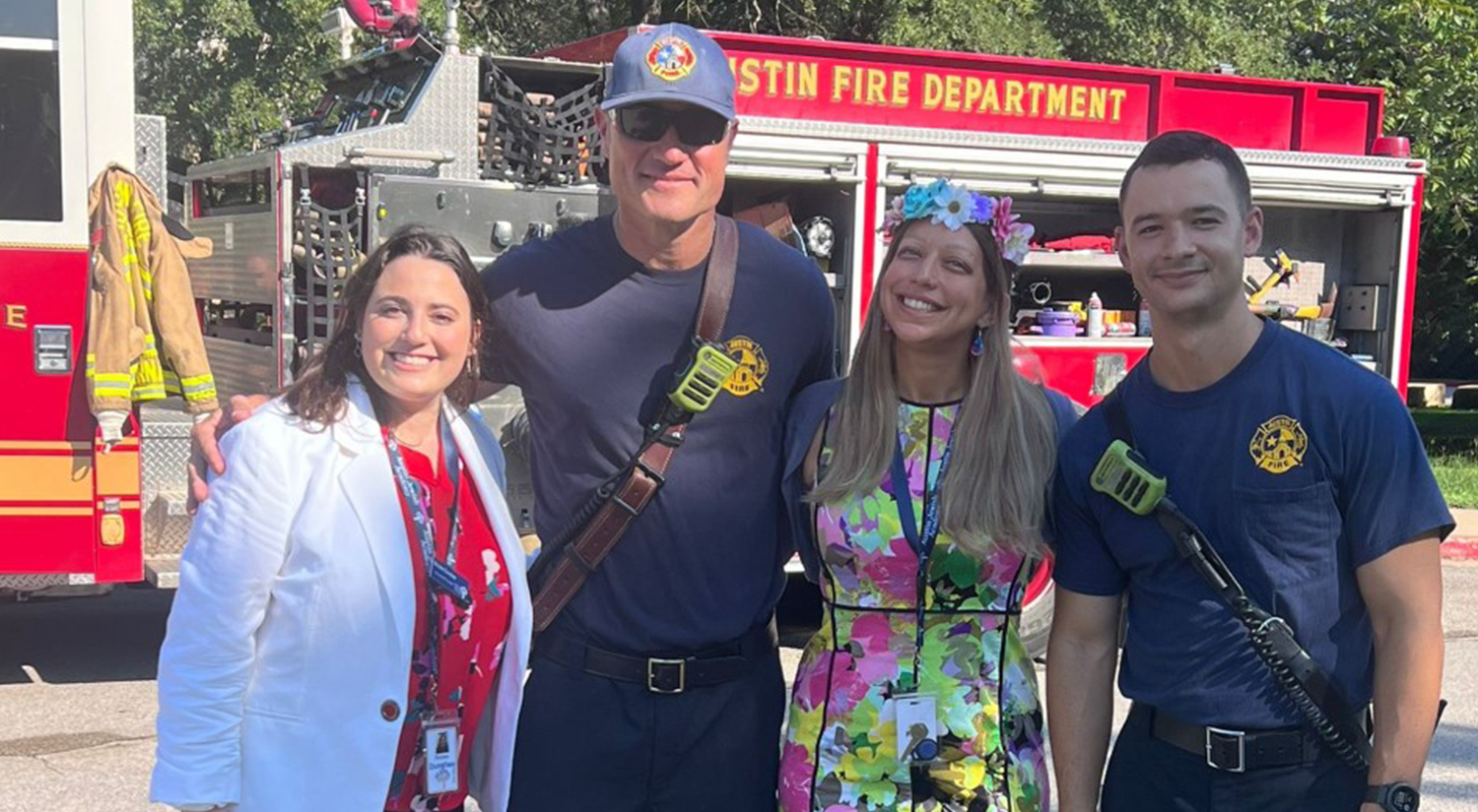 Austin Jewish Academy’s Brooke Dunshee and Aviva Melissa Frank with firefighters from Austin Fire Station 21