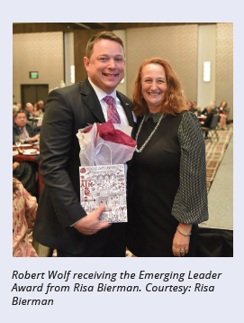 Robert Wolf receiving the Emerging Leader Award from Risa Bierman. Courtesy: Risa Bierman