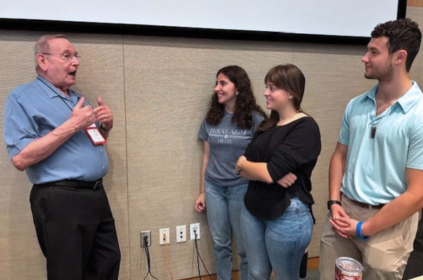 Marc Wormser (Texas A&M class of 1964) speaks with current A&M students, Ilanit Algranatti, Rachel Smet, and Dylan Mandel, about student life at Hillel. Courtesy: Sheldon Lippman