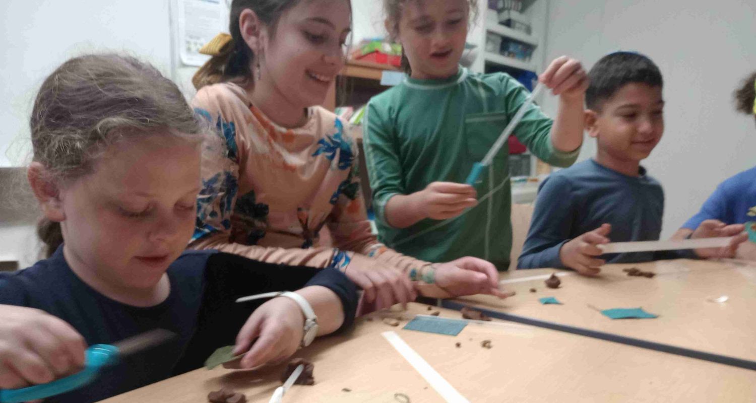 explore Hebrew words for Chanukah, lighting up their learning just like the candles on the menorah. Courtesy: Rochel Levertov