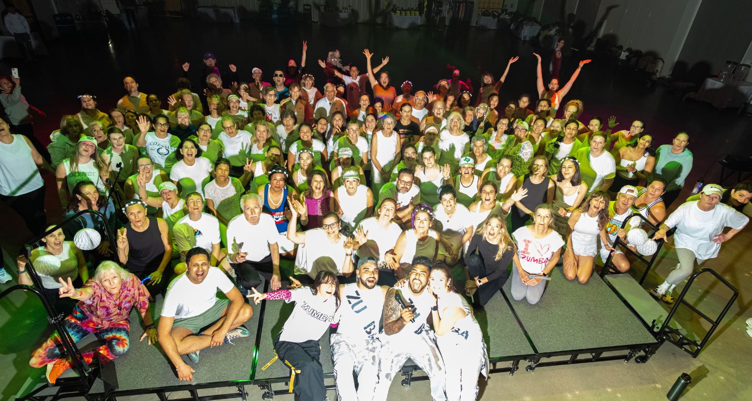 Participants enjoy the social and health benefits of Zumba at a Mega Zumba event at the Dell JCC. Credit: Andrew Holmes