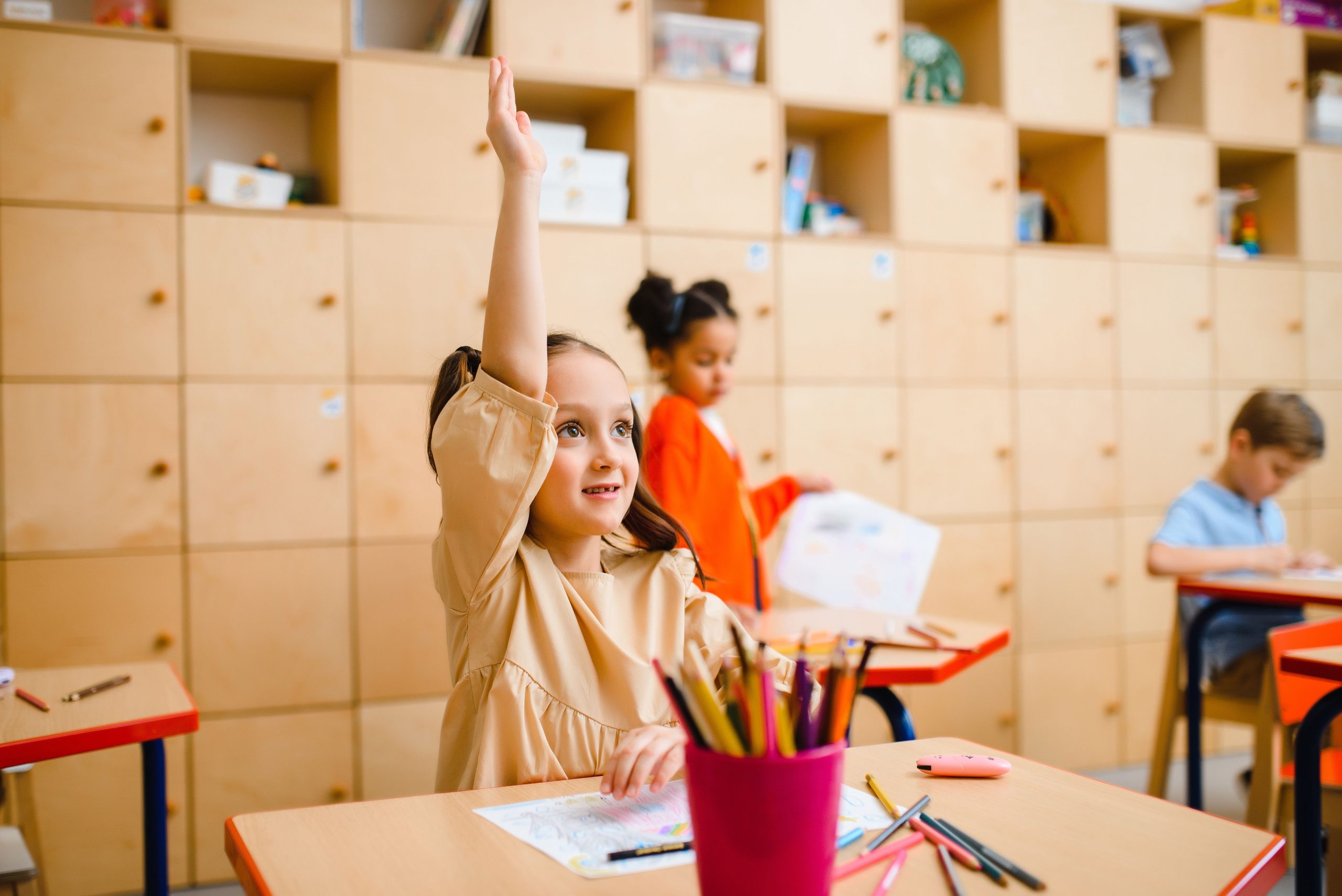 Children sitting at desks in a classroom at a Jewish school